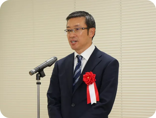 表彰式でスピーチを行う代表取締役社長 水野